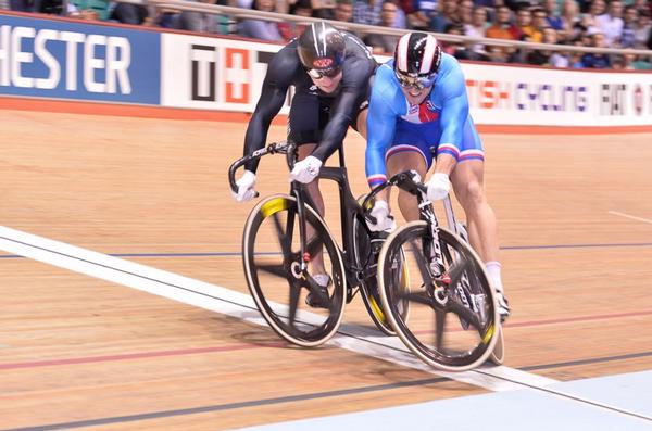 New Zealand's Eddie Dawkins crashes with Adam Ptacnik (CZE) in the first round of sprints. Dawkins was later relegated for the incident.